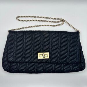 Steve Madden Quilted Shoulder Bag in Black.